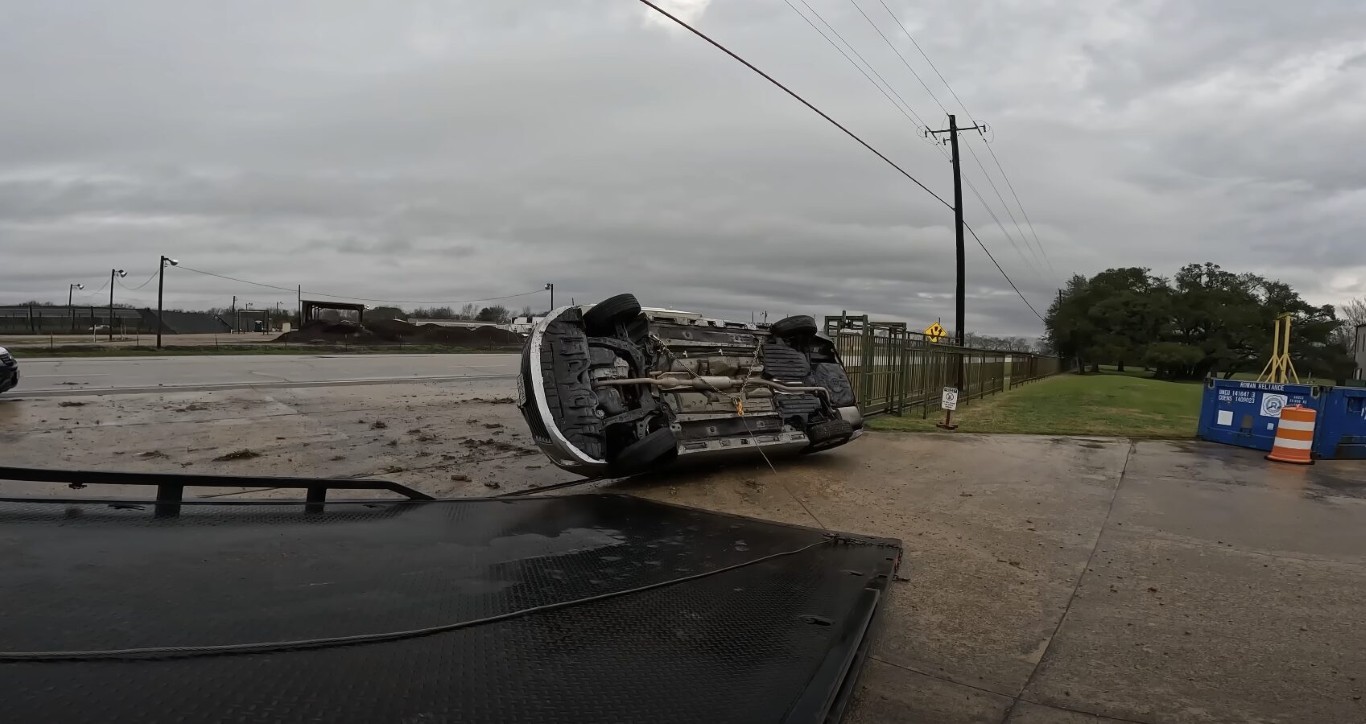 Emergency towing service for overturned vehicle on roadside in Mount Vernon, NY